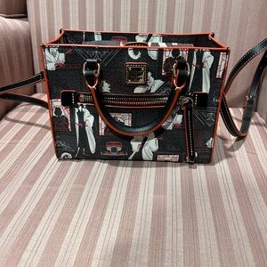 Cruella 2021 mini zip Dooney and Bourke